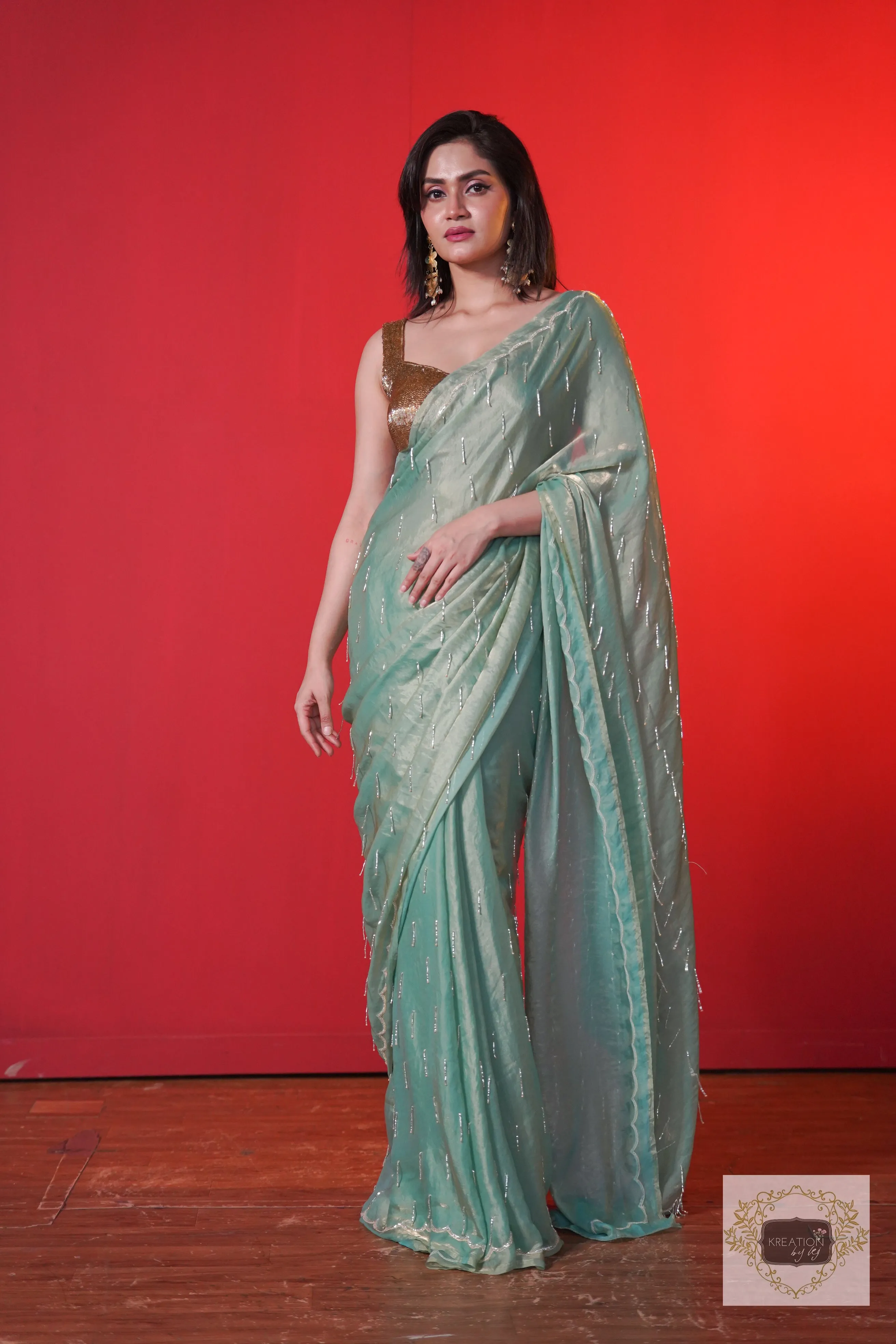 Chammak Challo Pastel Green Shimmer Satin Saree